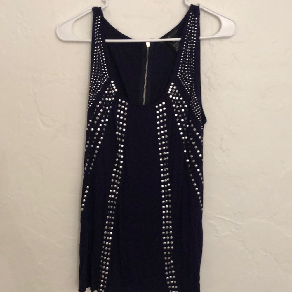 Nice blouse with beaded designs none missing.straps with zipper.